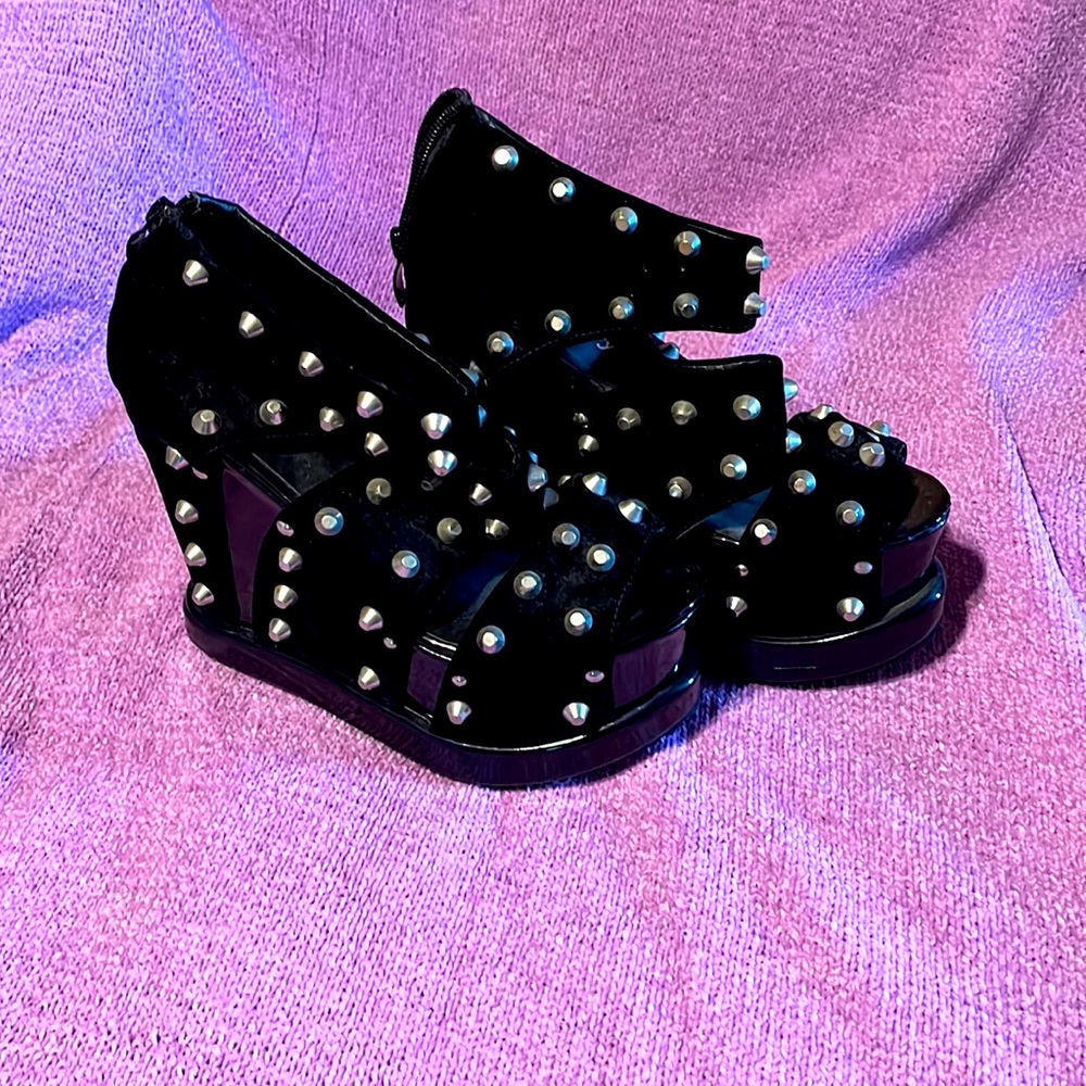 Rock and Rolling suede platform grommet black shoes… size US 7..run bigger